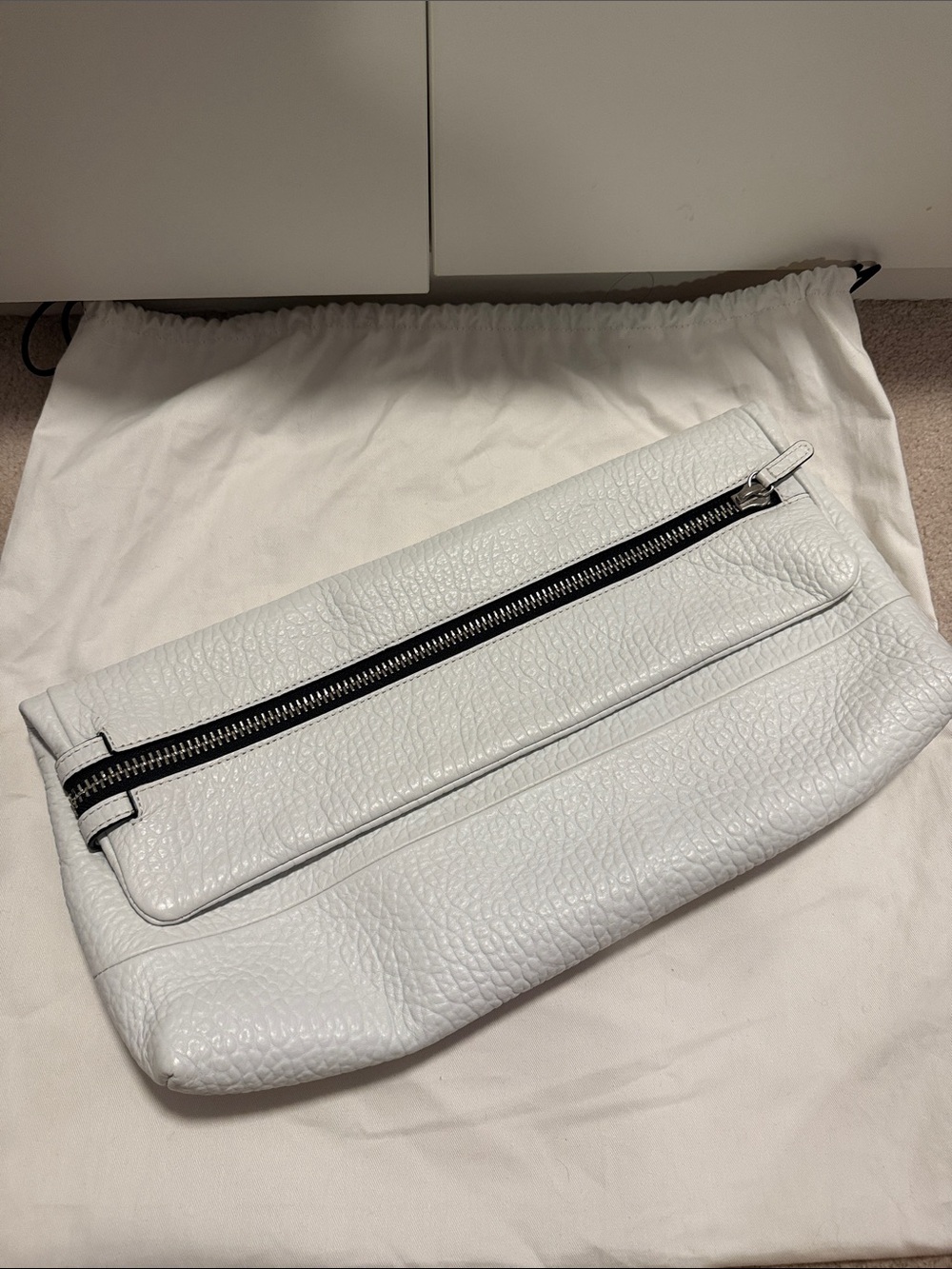 Aritzia White Pebbled Leather Zip Fold Clutch